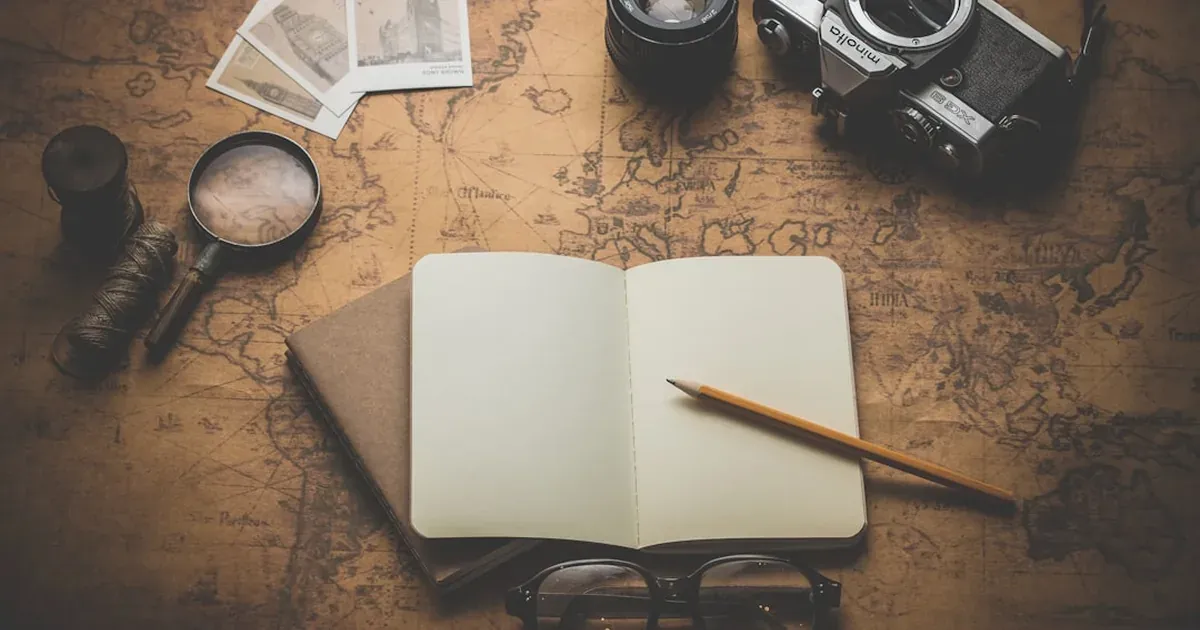 Travel planning with yen notes, map, and budget notebook for a Japan trip