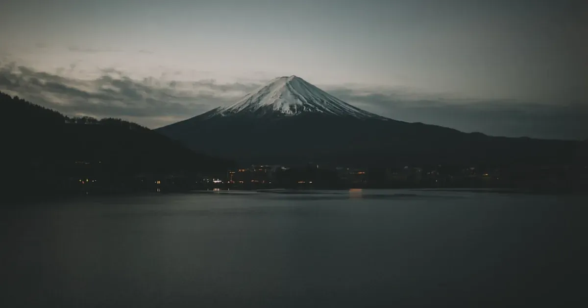 Mount Fuji perfectly reflected in Lake Ashi in Hakone Japan on a clear morning