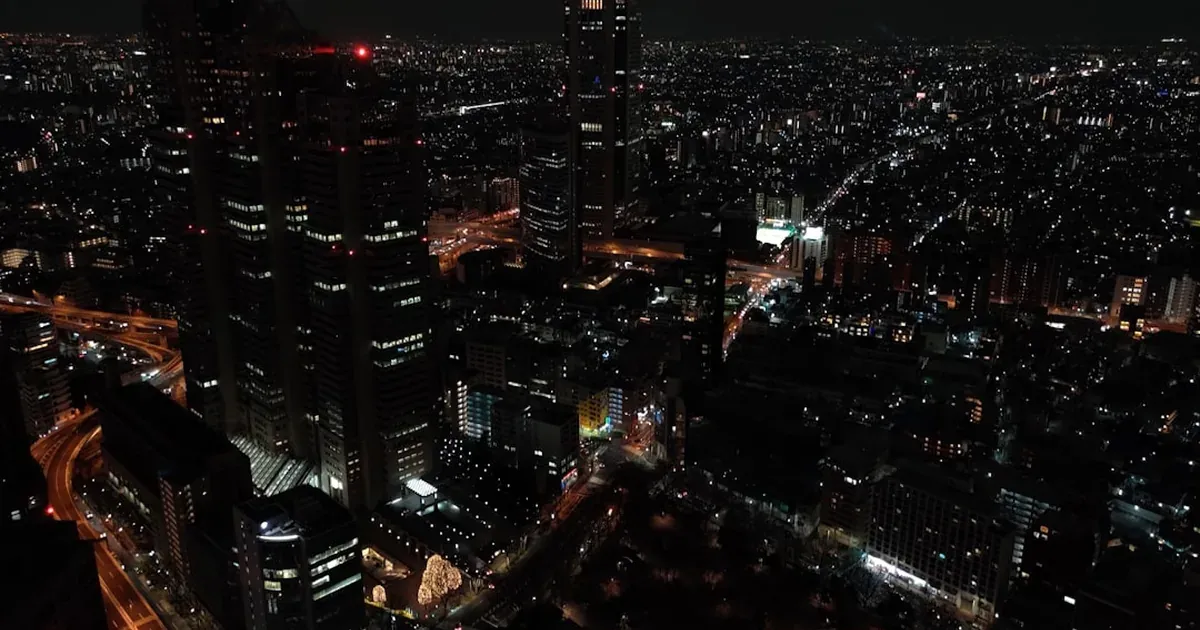 Tokyo skyline at dusk with skyscrapers and city lights