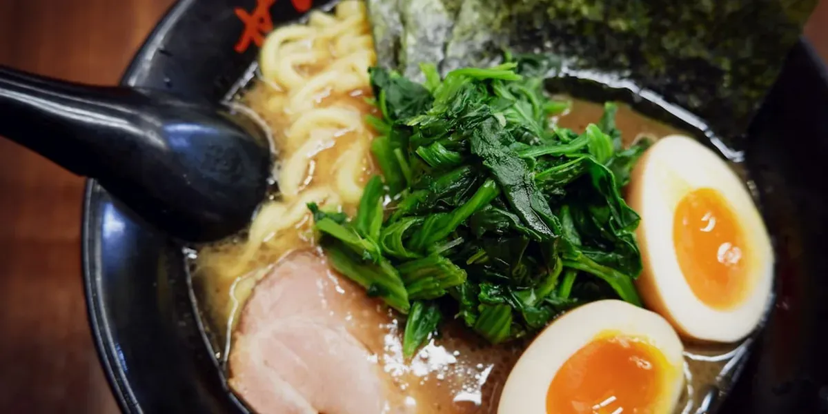 Bowl of Hakata tonkotsu ramen with thin noodles and rich milky pork bone broth