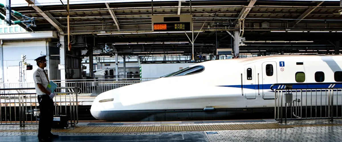 Shinkansen bullet train at a Japanese station platform