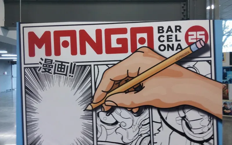 Private booth inside a Japanese manga cafe with reclining chair, screens and manga shelves