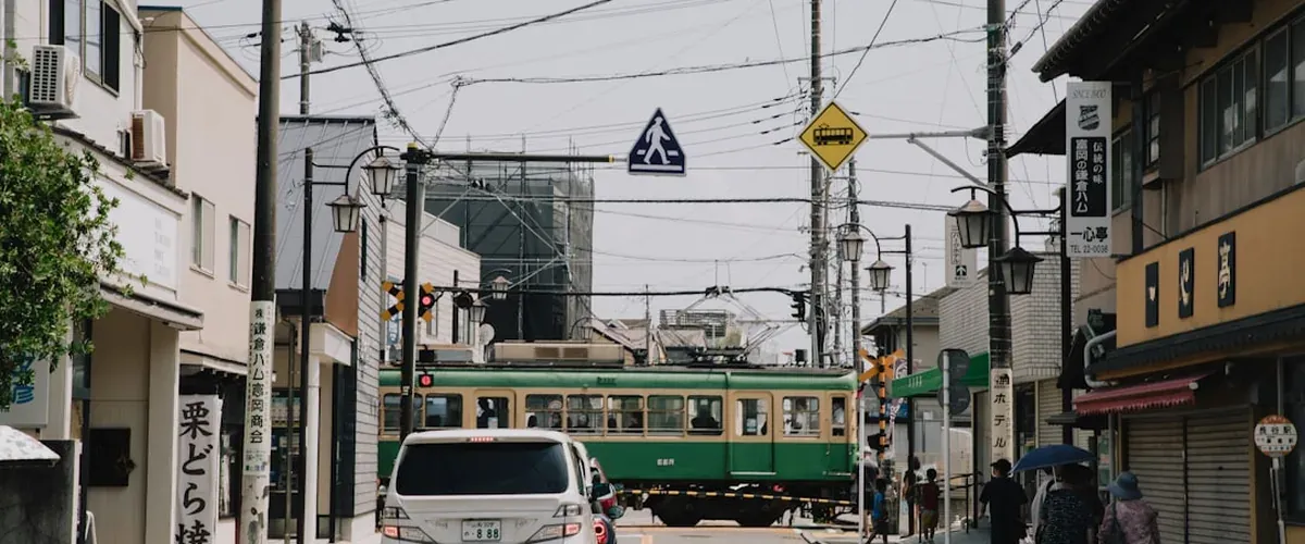 Hiroshima historic streetcar tram running through the Hondori shopping area
