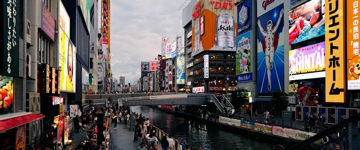 Den Den Town (Nipponbashi) street in Osaka with electronics and anime shop signs